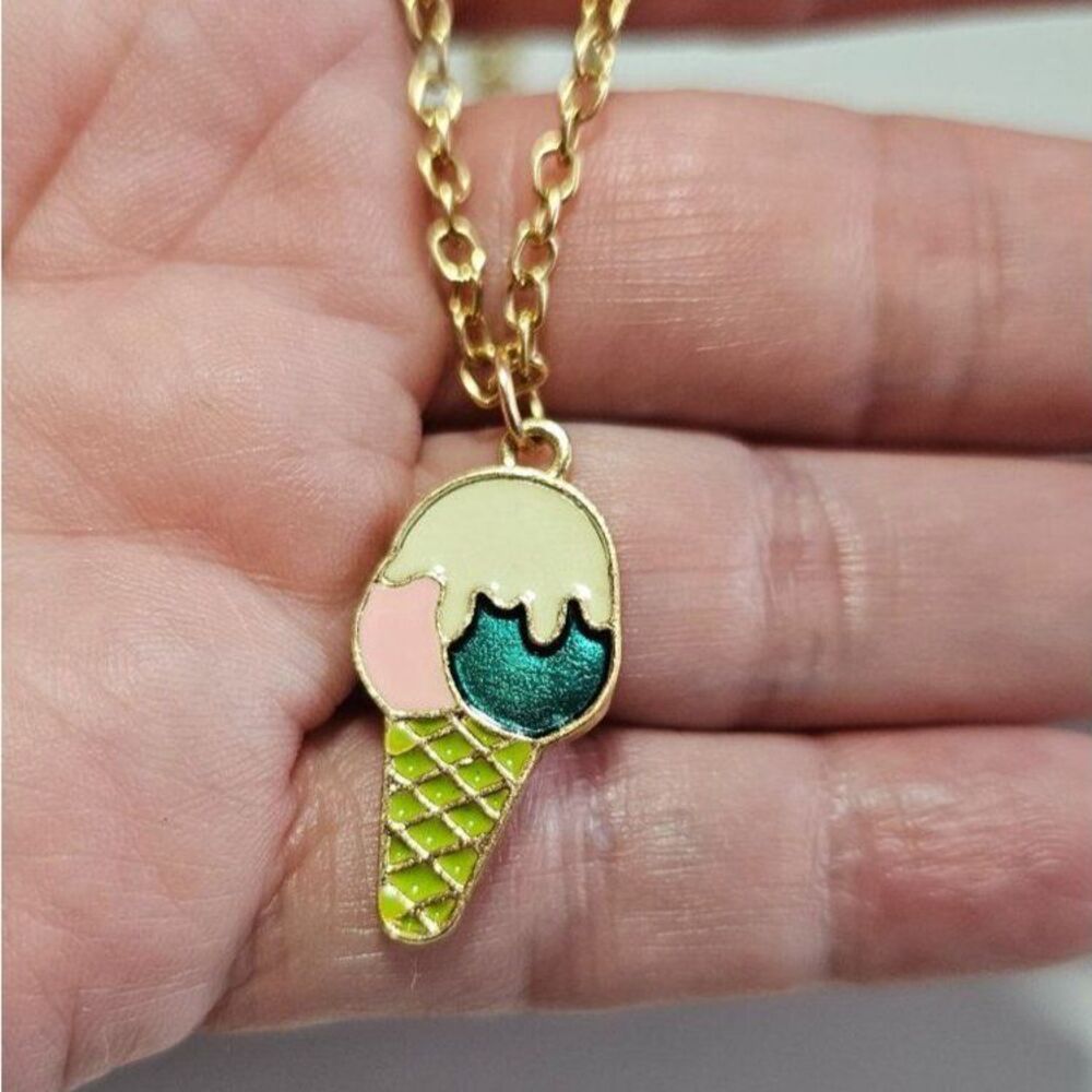 Gold tone ice cream pendant necklace 21-23"